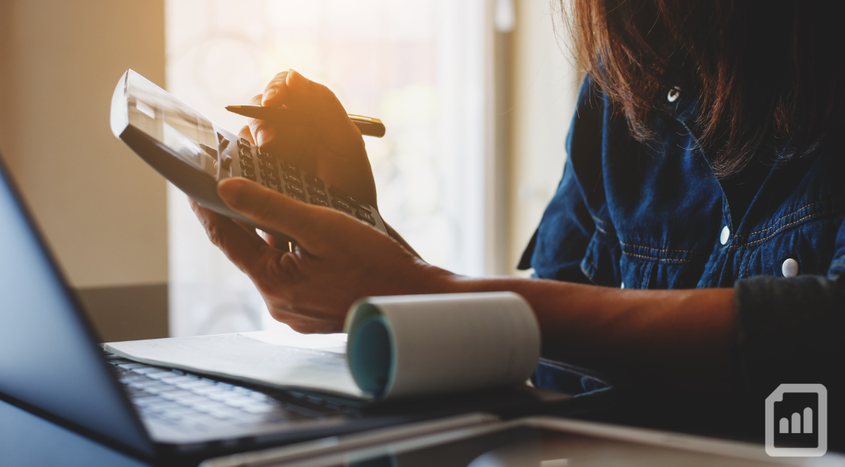 woman using calculator