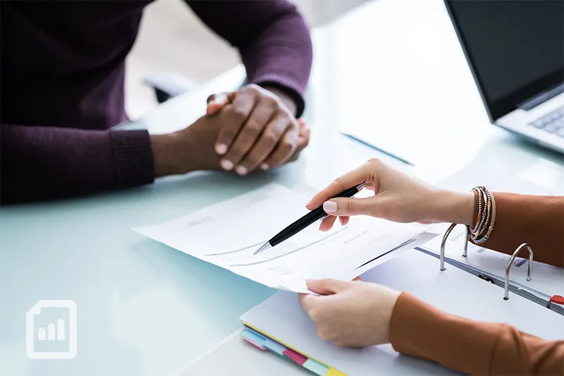 a financial advisor helping an optometrist with tax planning